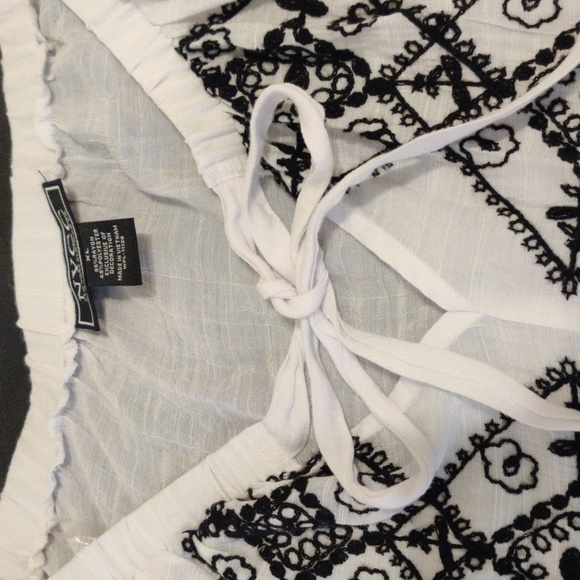 NYCC Semi-transparent white blouse with black embroidery on the front. - Picture 3 of 10